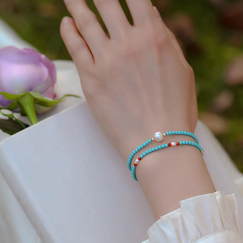 Pulsera de protección de pequeñas cuentas de piedras de Buda con turquesa, ágata roja y perla