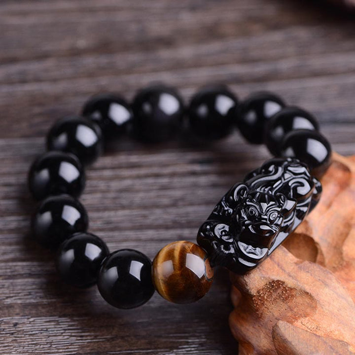 Pulsera de fuerza de ojo de tigre y PiXiu de obsidiana negra natural de Buddha Stones