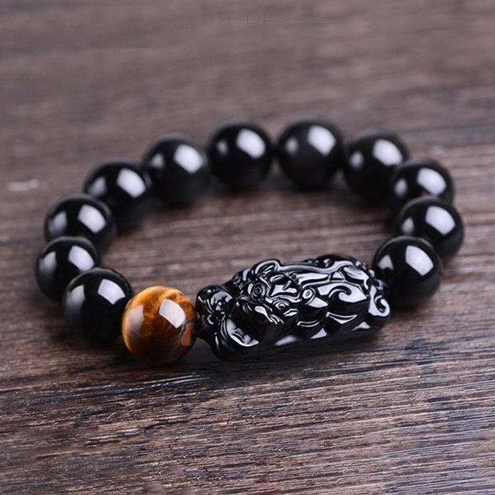 Pulsera de fuerza de ojo de tigre y PiXiu de obsidiana negra natural de Buddha Stones