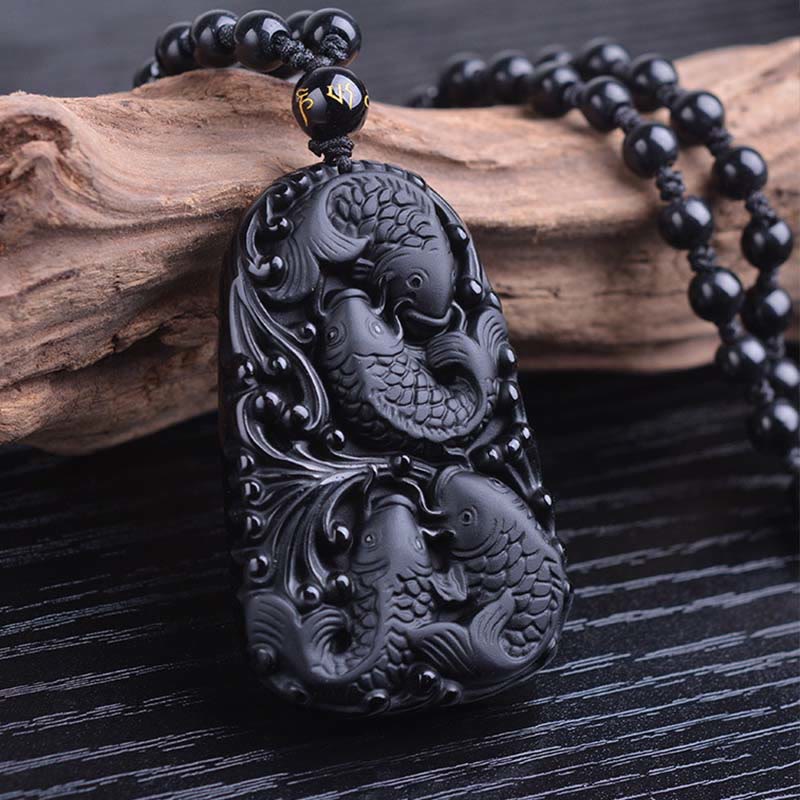 Colgante de collar con cuentas grabadas de fuerza con pez koi en obsidiana negra de Buddha Stones - image 11