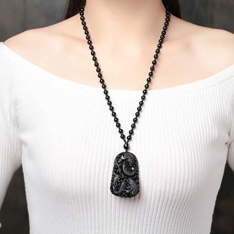 Colgante de collar con cuentas grabadas de fuerza con pez koi en obsidiana negra de Buddha Stones - image 19