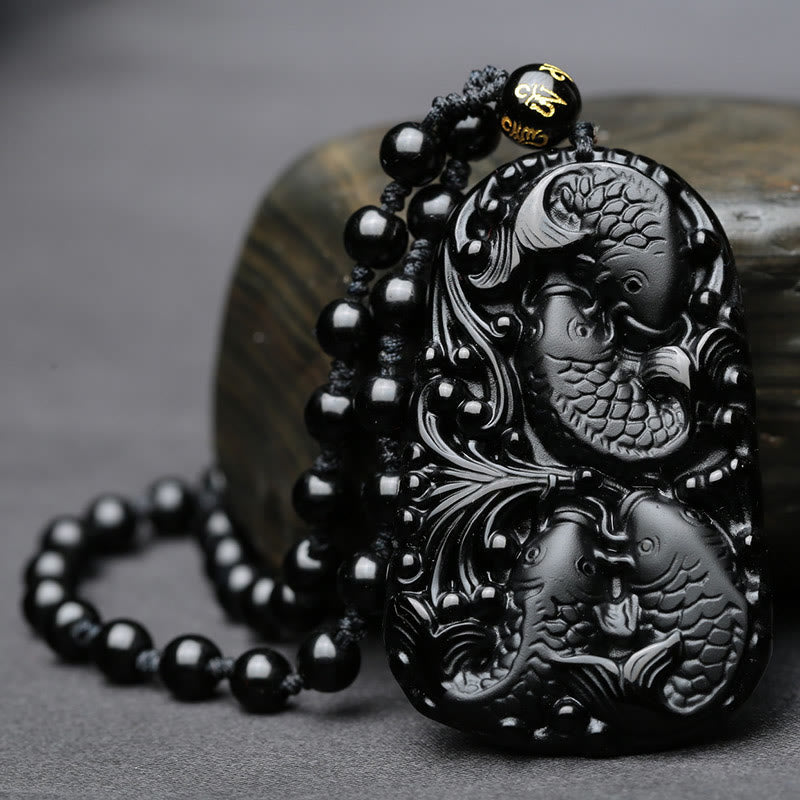 Colgante de collar con cuentas grabadas de fuerza con pez koi en obsidiana negra de Buddha Stones - image 4
