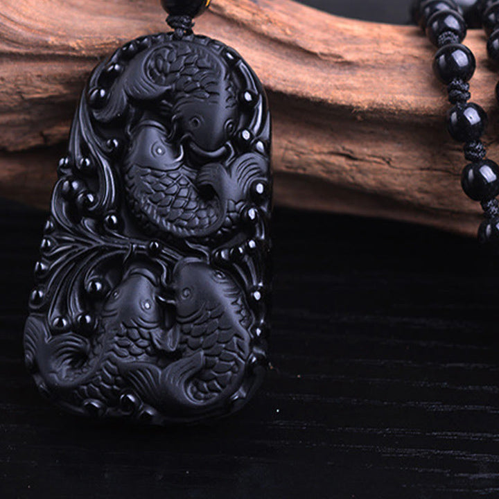 Colgante de collar con cuentas grabadas de fuerza con pez koi en obsidiana negra de Buddha Stones - image 14