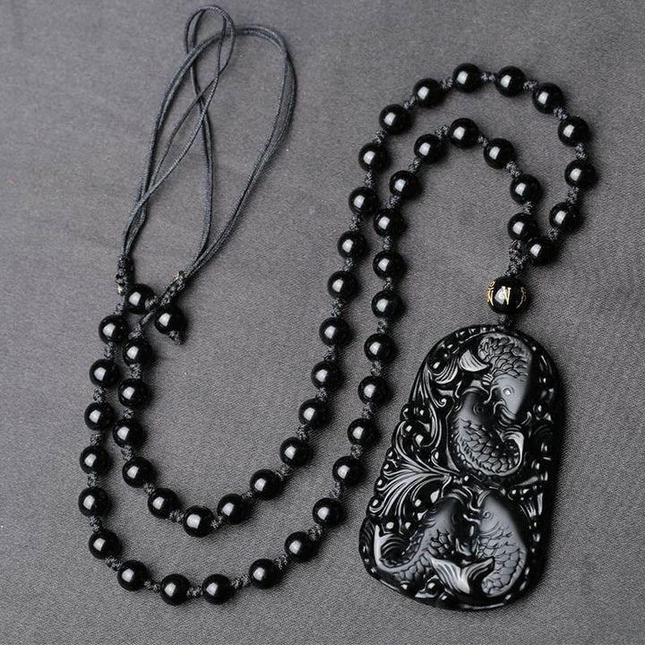 Colgante de collar con cuentas grabadas de fuerza con pez koi en obsidiana negra de Buddha Stones - image 10