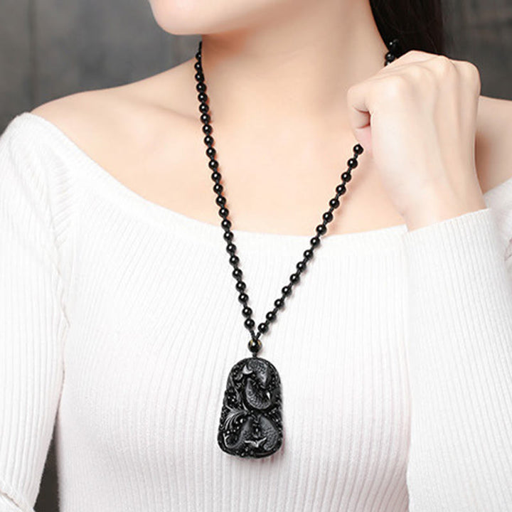 Colgante de collar con cuentas grabadas de fuerza con pez koi en obsidiana negra de Buddha Stones - image 21