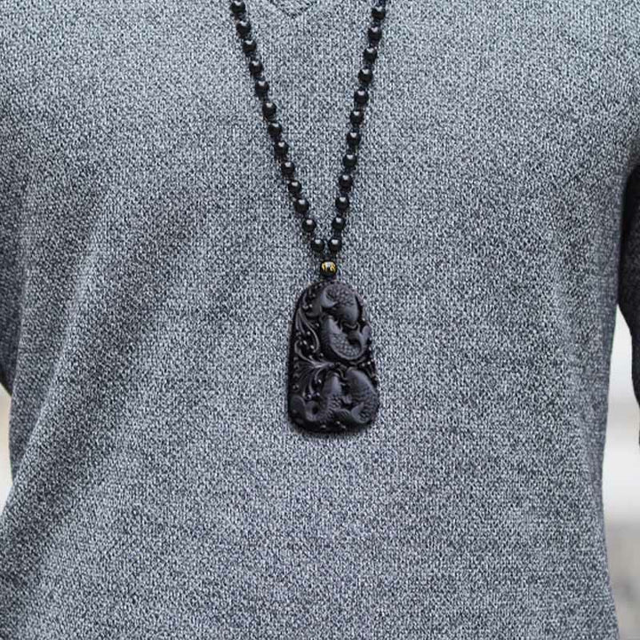 Colgante de collar con cuentas grabadas de fuerza con pez koi en obsidiana negra de Buddha Stones - image 17