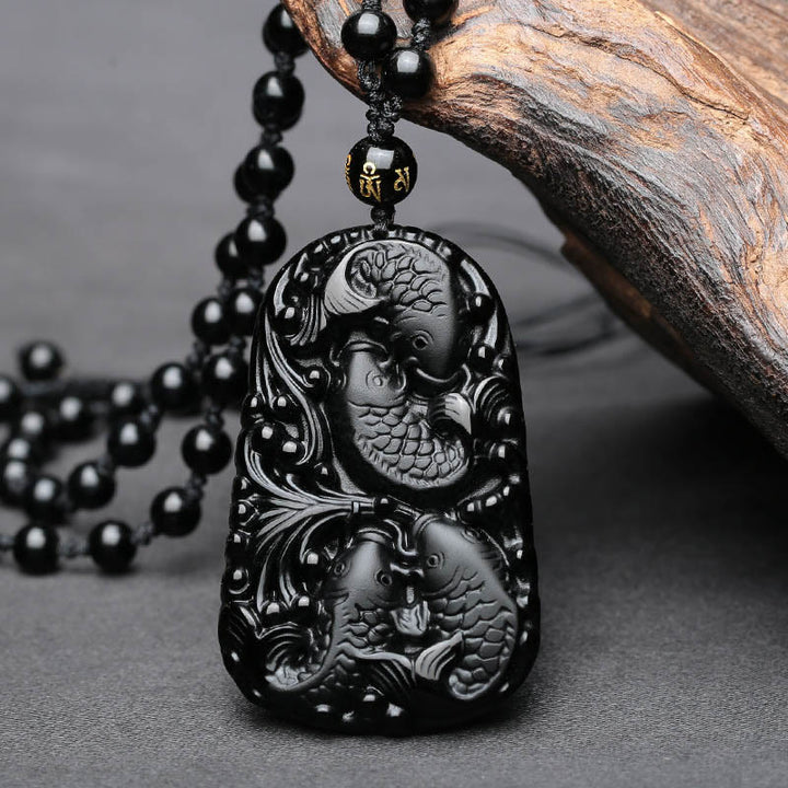 Colgante de collar con cuentas grabadas de fuerza con pez koi en obsidiana negra de Buddha Stones - image 8