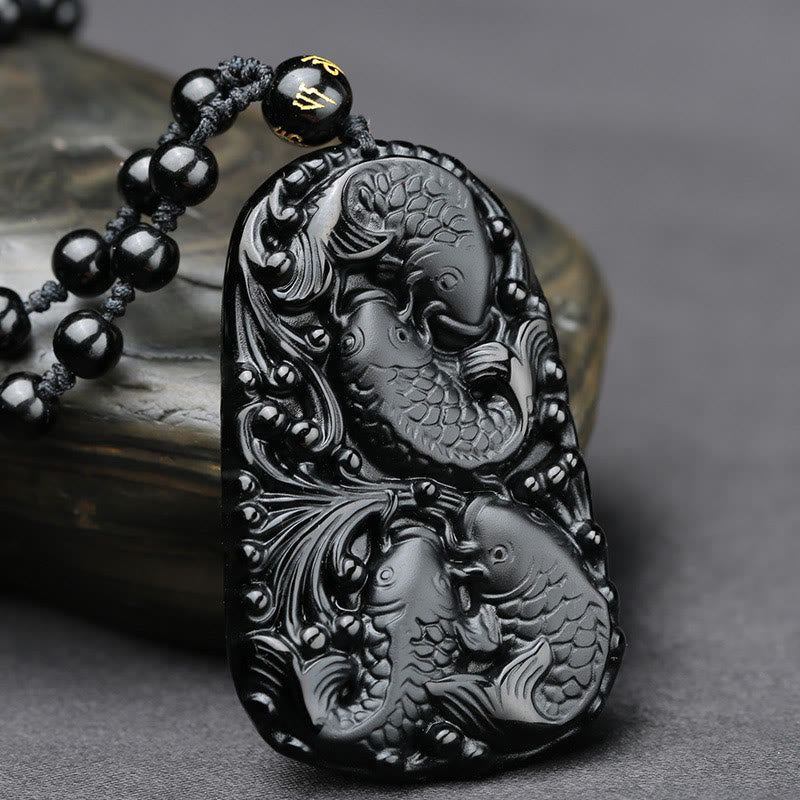 Colgante de collar con cuentas grabadas de fuerza con pez koi en obsidiana negra de Buddha Stones - image 2