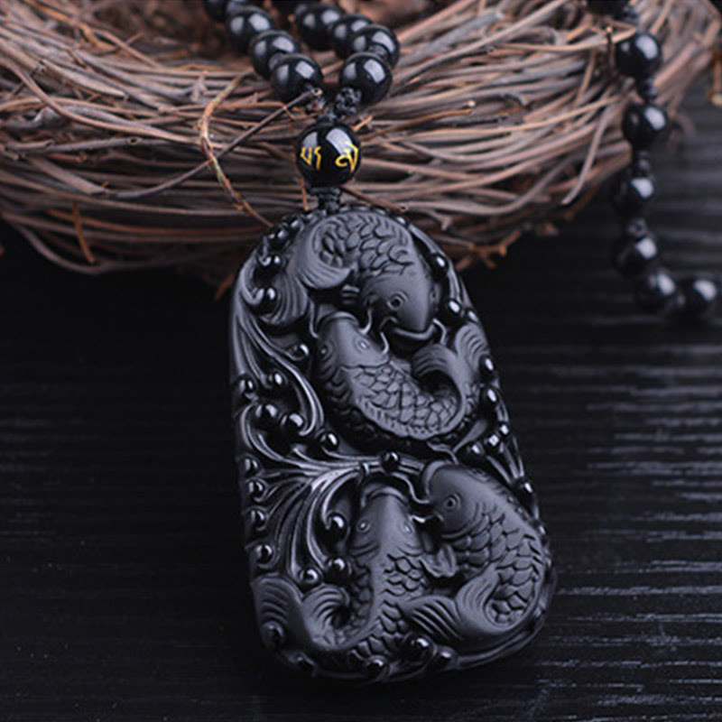 Colgante de collar con cuentas grabadas de fuerza con pez koi en obsidiana negra de Buddha Stones - image 12