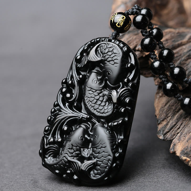 Colgante de collar con cuentas grabadas de fuerza con pez koi en obsidiana negra de Buddha Stones - image 3