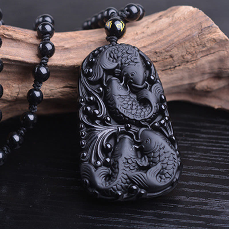 Colgante de collar con cuentas grabadas de fuerza con pez koi en obsidiana negra de Buddha Stones - image 13