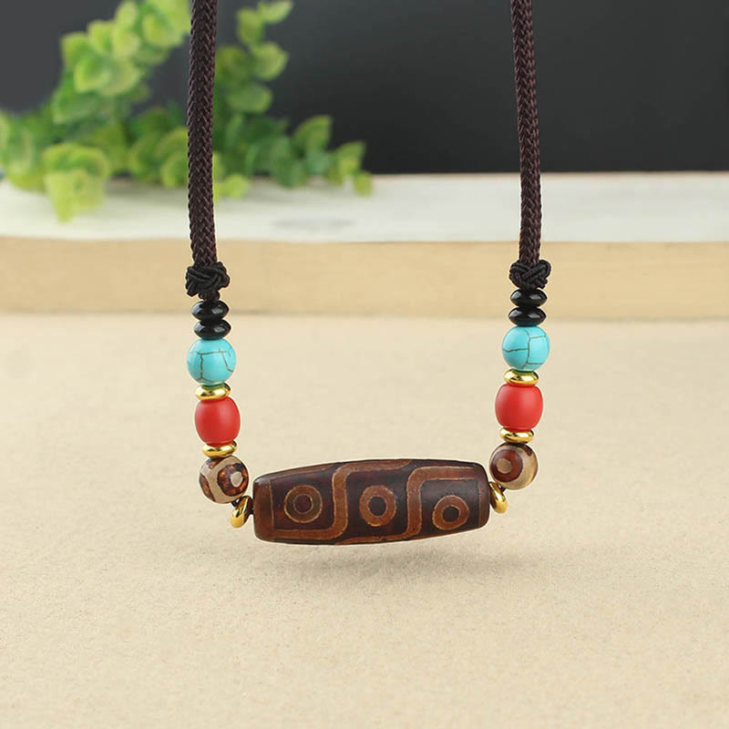 Buddha Stones Joyas Tibetanas de Ojo de Nueve Dzi Cuentas Dzi de Tres Ojos Collar de Protección Colgante