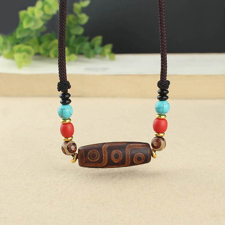 Buddha Stones Joyas Tibetanas de Ojo de Nueve Dzi Cuentas Dzi de Tres Ojos Collar de Protección Colgante