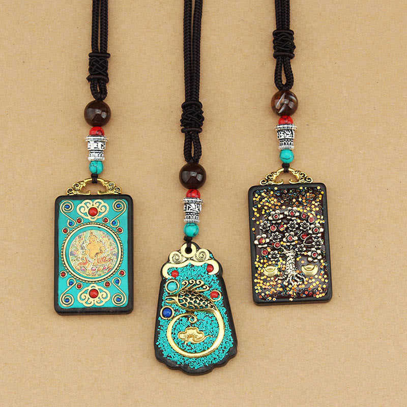 Buddha Stones Tibet Dios de la Riqueza Árbol del Dinero Fénix Dorado Thangka Colgante Collar de Ébano Paz