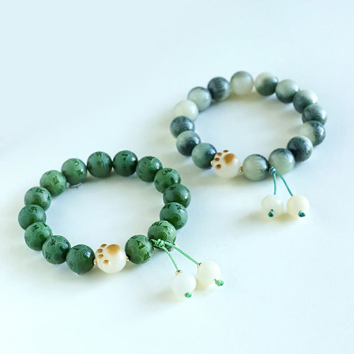 Buddha Stones Pulsera Armonía Tallada Om Mani Padme Hum de Semilla de Bodhi