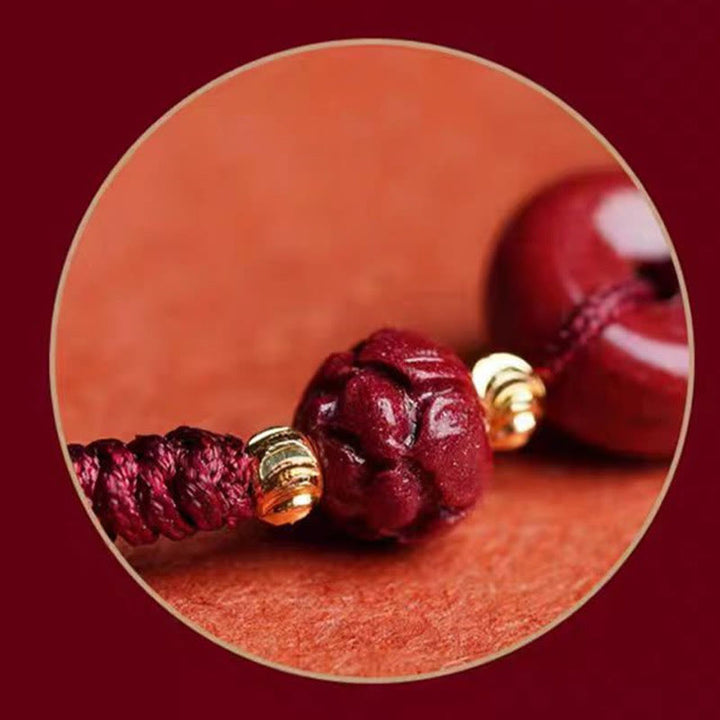 Buddha Stones Pulsera tejida a mano de cinabrio con hebilla de paz de loto, bendición y calma