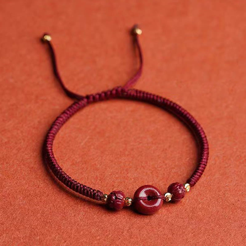 Buddha Stones Pulsera tejida a mano de cinabrio con hebilla de paz de loto, bendición y calma