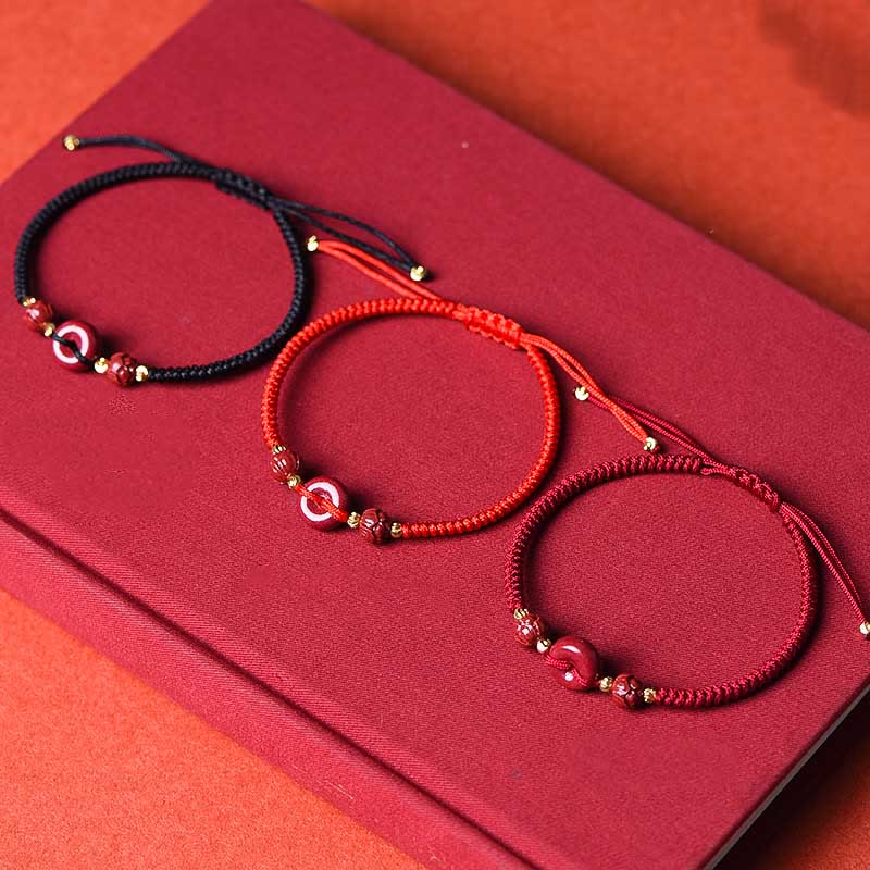 Buddha Stones Pulsera tejida a mano de cinabrio con hebilla de paz de loto, bendición y calma
