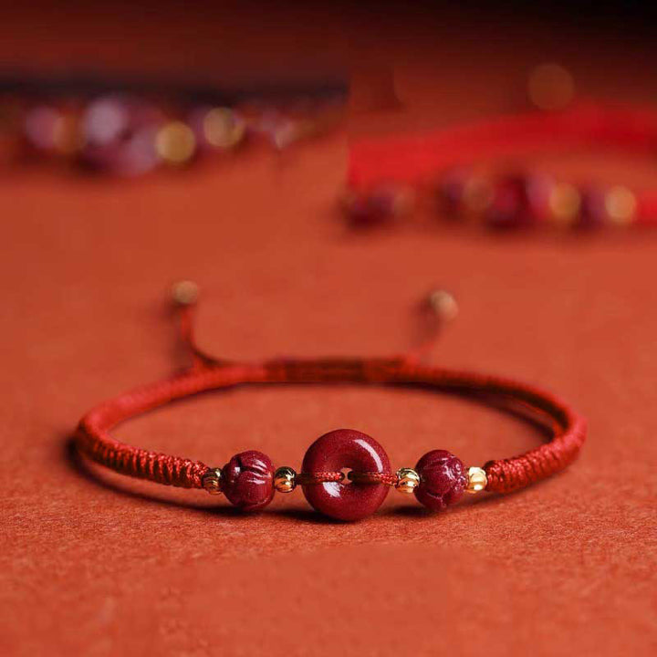 Buddha Stones Pulsera tejida a mano de cinabrio con hebilla de paz de loto, bendición y calma