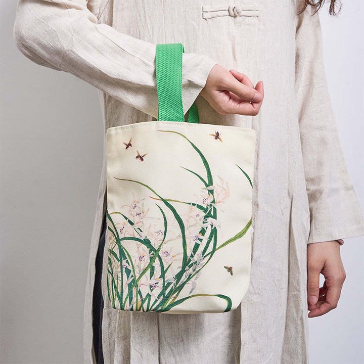 Bolso de lona con orquídea y abeja de Buddha Stones