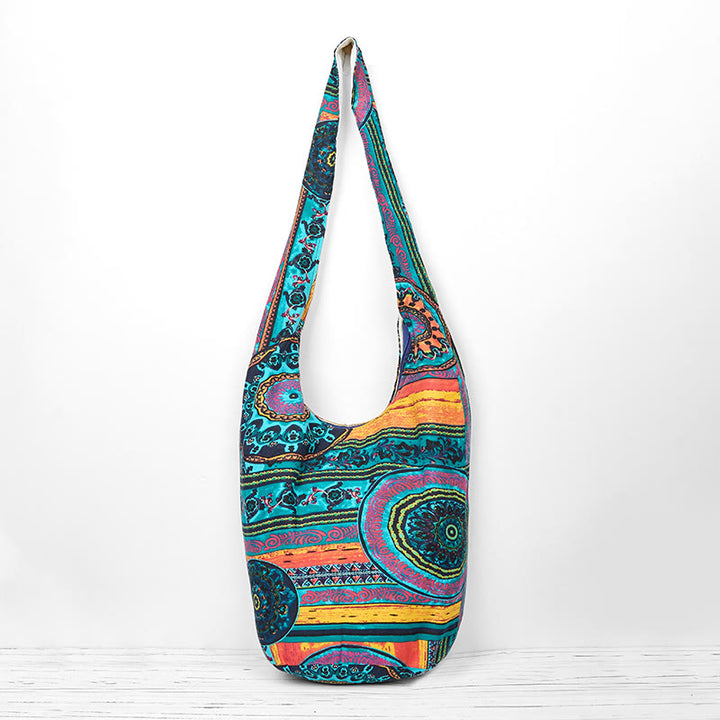 Bolso bandolera de algodón con estampado de flores azules Buddha Stones