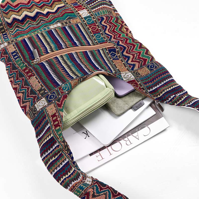 Bolso bandolera de algodón con patrón de olas verdes y marrones de Buddha Stones