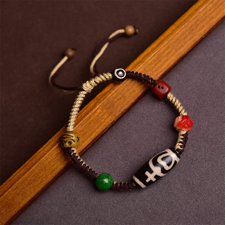 Pulsera de cuerda trenzada de riqueza con cuentas tibetanas Dzi hechas a mano de Buddha Stones