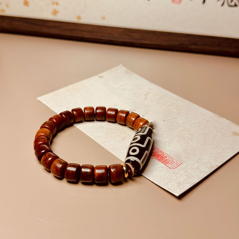 Pulsera protectora de cuentas dzi de nueve ojos con cuentas de hueso tibetano de Buddha Stones