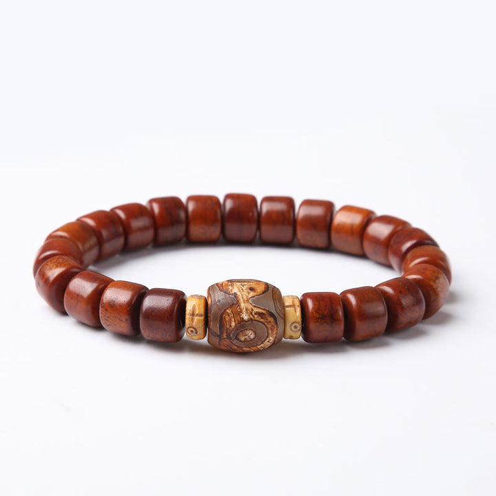 Pulsera de fuerza con Buddha Stones de hueso tibetano, cuentas Dzi de tres ojos, cuerno de oveja y ágata roja