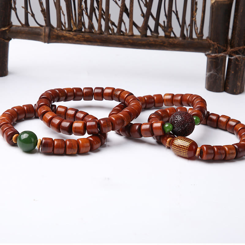 Pulsera de fuerza con Buddha Stones de hueso tibetano, cuentas Dzi de tres ojos, cuerno de oveja y ágata roja