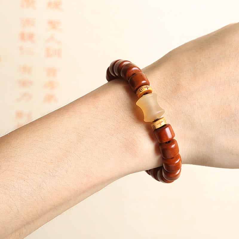 Pulsera de fuerza con Buddha Stones de hueso tibetano, cuentas Dzi de tres ojos, cuerno de oveja y ágata roja