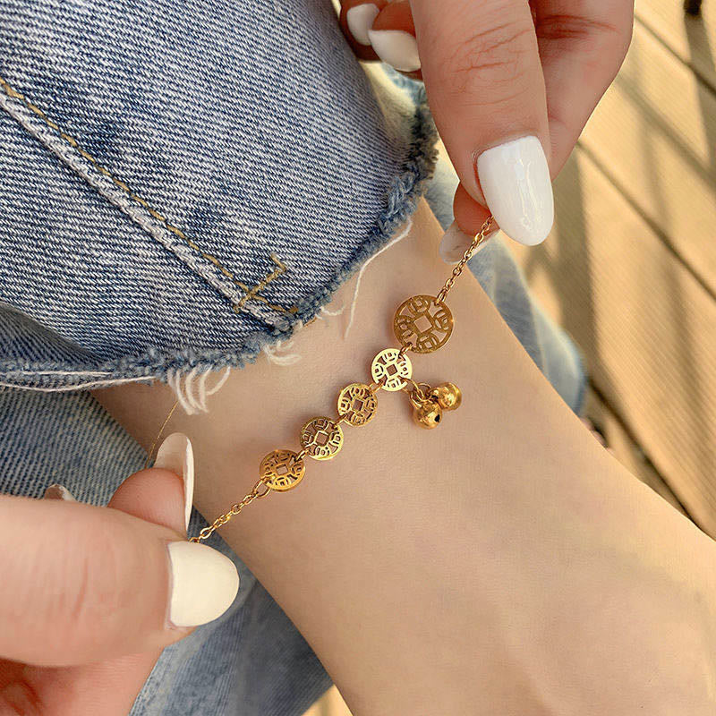 Buddha Stones Monedas de cobre Encanto de campana Tobillera reforzada de acero de titanio