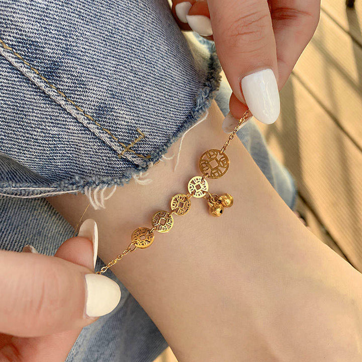 Buddha Stones Monedas de cobre Encanto de campana Tobillera reforzada de acero de titanio