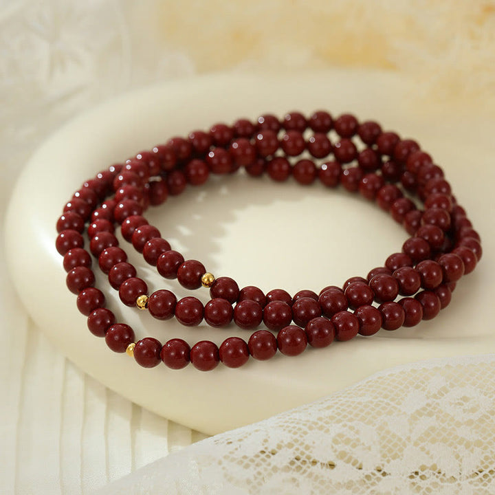 Buddha Stones tobillo de bendición con cuentas de cinabrio y plata de ley 925