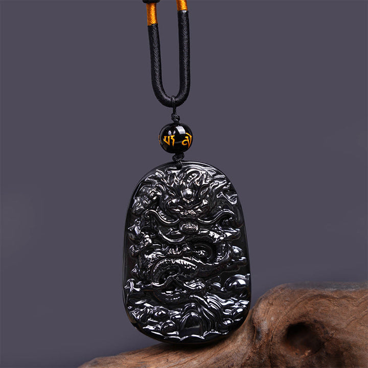 Colgante de protección con dragón tallado en obsidiana negra Buddha Stones - Dragón ovalado 58 mm x 41 mm - image 1