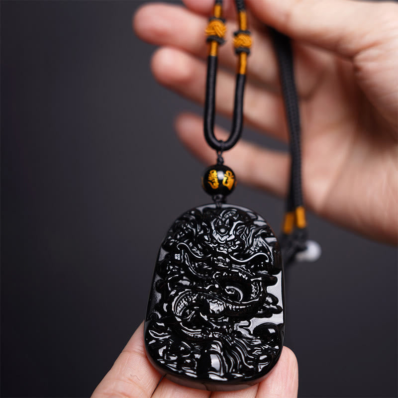 Colgante de protección con dragón tallado en obsidiana negra Buddha Stones - image 3