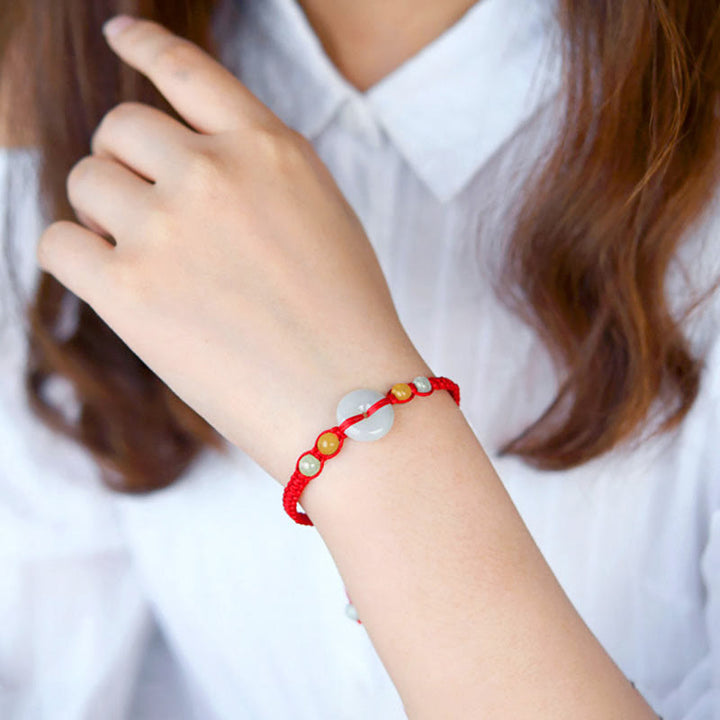 Buddha Stones Pulsera de cuerda roja con adorno de jade y hebilla de paz para la suerte