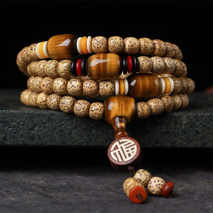 Buddha Stones 108 cuentas de mala semilla de Bodhi ojo de tigre carácter Fu pulsera de paz