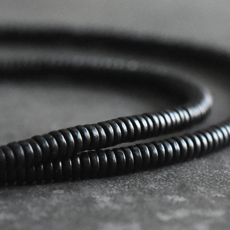 Pulsera multicapa de cuentas de madera de ébano tibetano de Buddha Stones y cobre de la paz