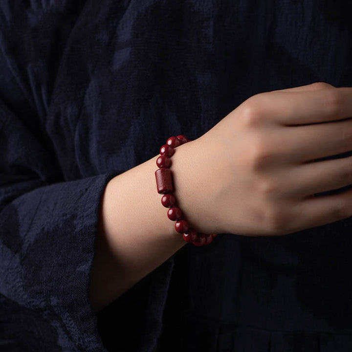 Pulsera de bendición de sutra de corazón de cinabrio natural con Buddha Stones