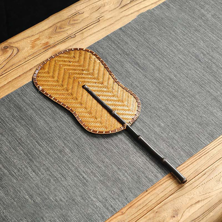 Buddha Stones Hecho a mano estilo chino abanico de bambú tejido redondo ovalado forma de plátano con mango largo