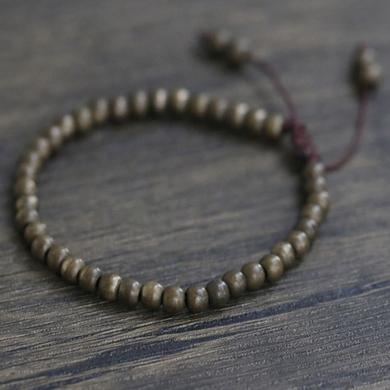 Pulsera sencilla de equilibrio de riqueza con cuentas de cobre y latón y Buddha Stones