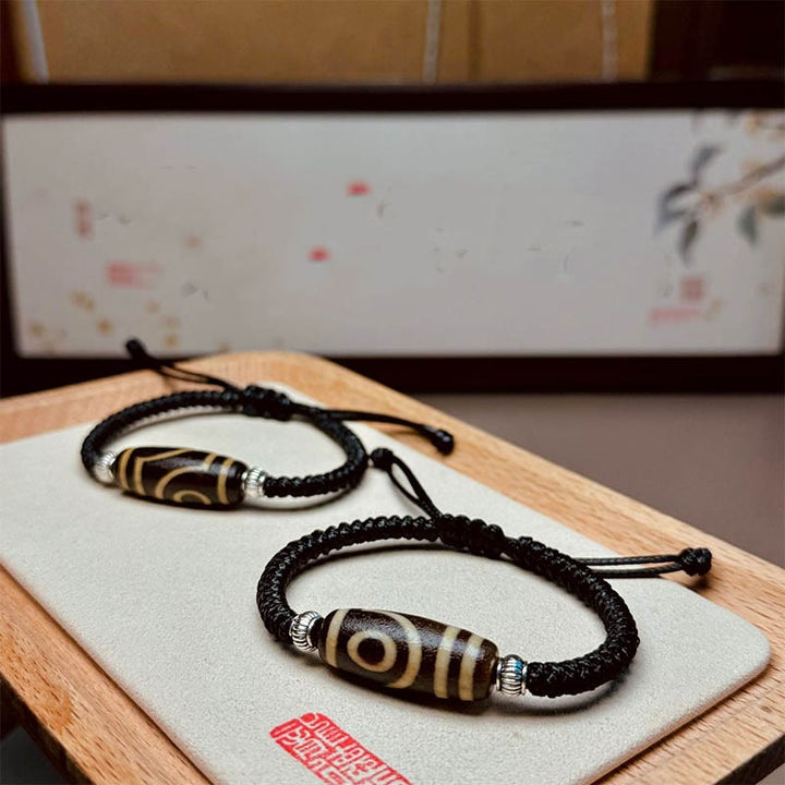 Buddha Stones Pulsera de Cuerda de Protección de Riqueza con Cuentas Dzi Tibetanas de Nueve Ojos y Cuentas Dzi de Tres Ojos
