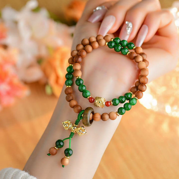 Pulsera de protección y curación con diseño de doble torsión de Dorje Vajra del Tíbet con cuentas de madera de sándalo y Buddha Stones