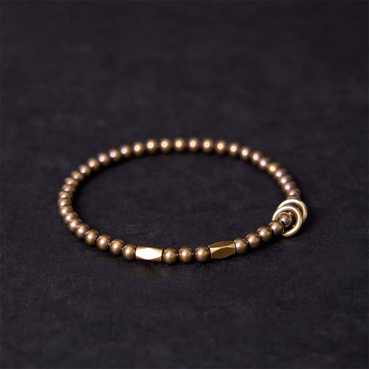 Pulsera de pareja con diseño de cuentas de cobre y latón para el cuidado personal y la riqueza de Buddha Stones - image 2