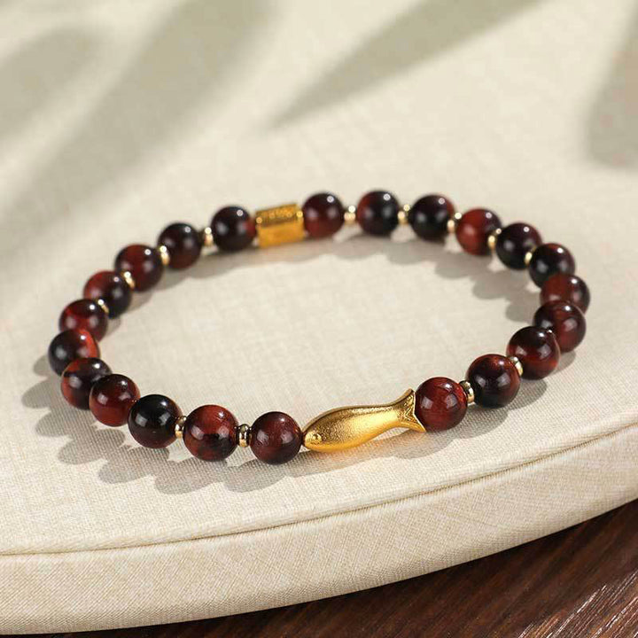Pulsera de coraje con pez koi y ojo de tigre de Buddha Stones