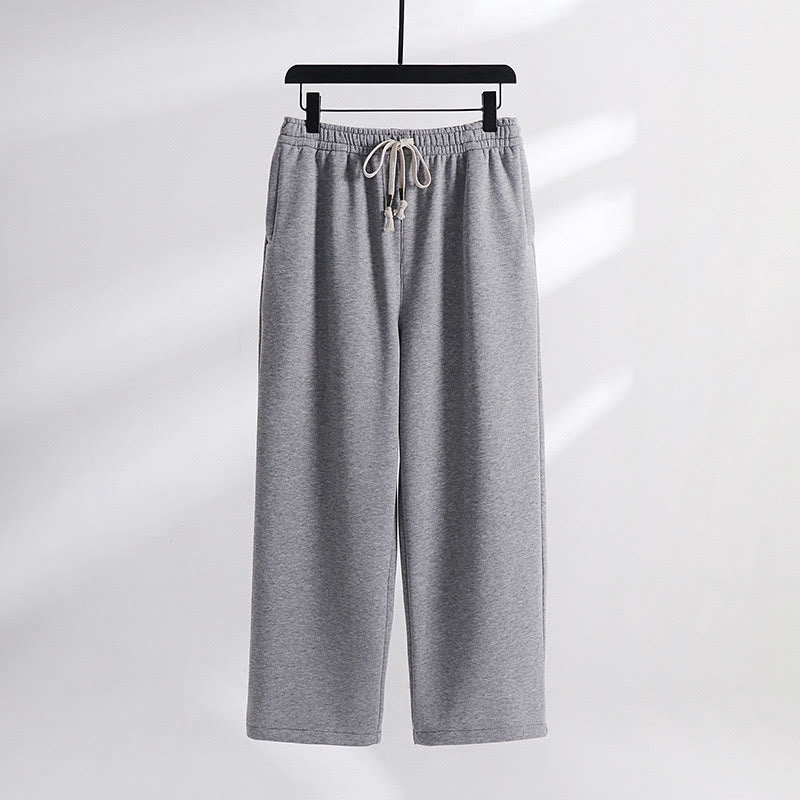 Pantalones de hombre con bolsillos y tejido polar de algodón de color liso con Buddha Stones