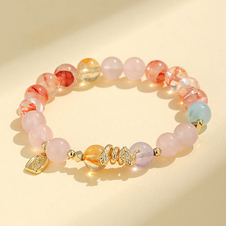 Pulsera de la suerte del año de la serpiente con Buddha Stones, varios cristales, cristal rosa y amatista
