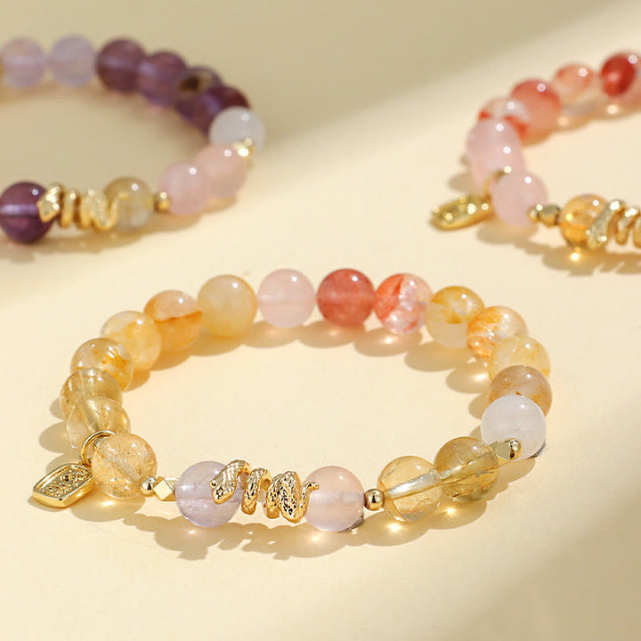 Pulsera de la suerte del año de la serpiente con Buddha Stones, varios cristales, cristal rosa y amatista
