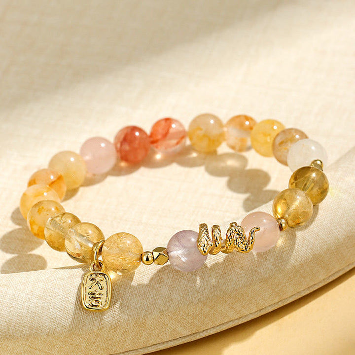 Pulsera de la suerte del año de la serpiente con Buddha Stones, varios cristales, cristal rosa y amatista